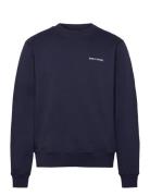 Craft Sweater Tops Sweat-shirts & Hoodies Sweat-shirts Navy Daily Pape...
