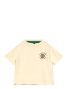 Tnstordell Uni Os S_S Tee Tops T-shirts Short-sleeved Cream The New